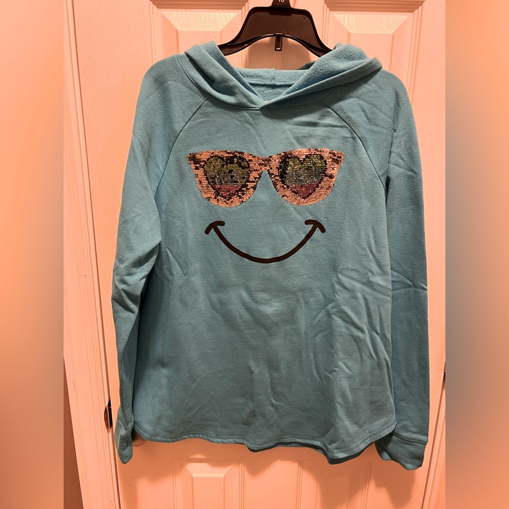 Justice hoodie with reversible sequins. Size 20 plus. Like new.